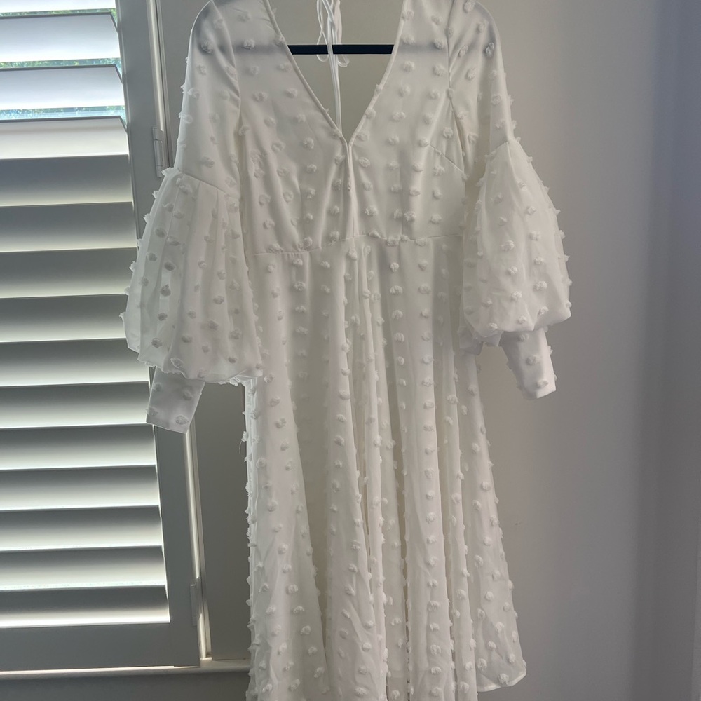 Elegant White Dress with Textured Design